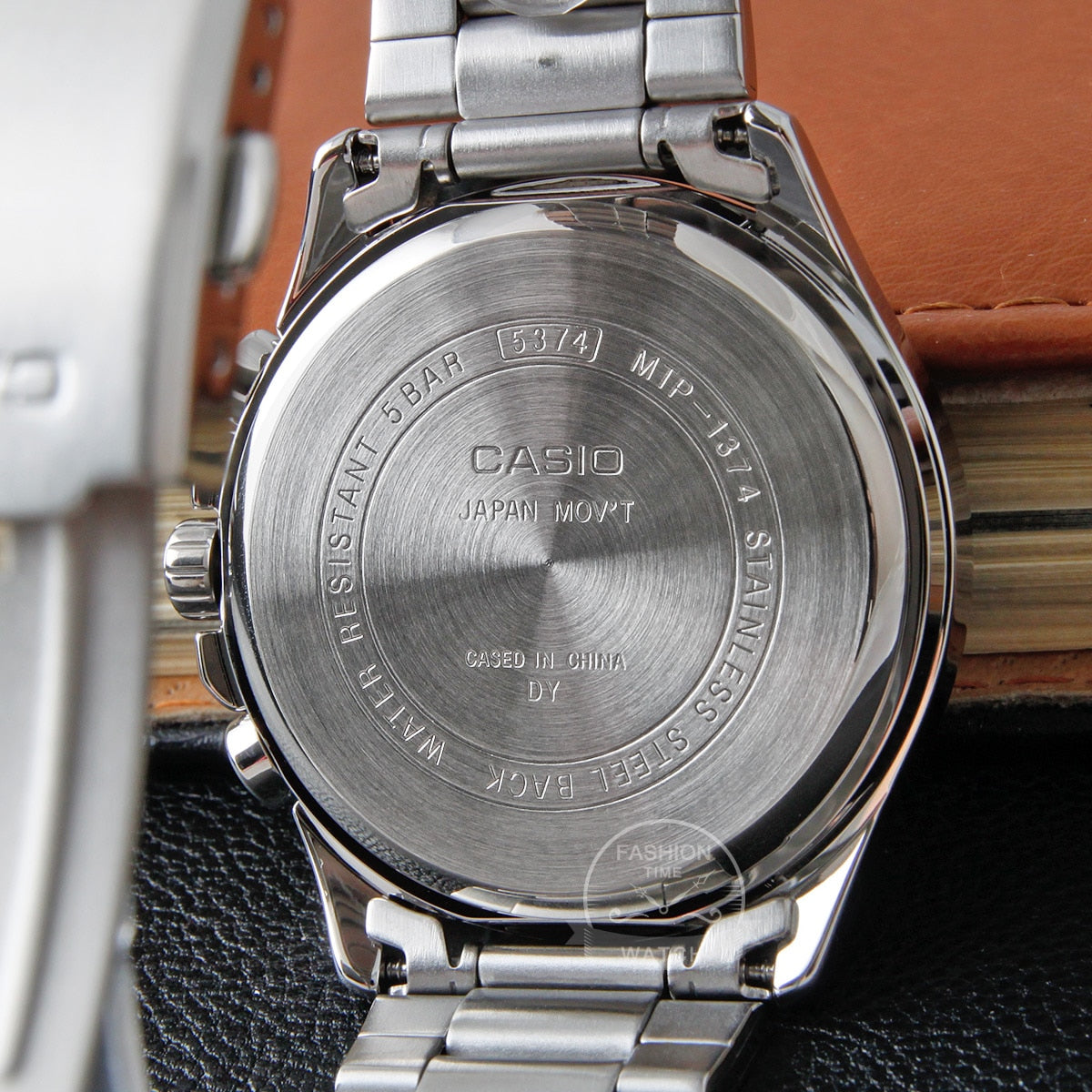 Casio Men's Quartz Watch: 50M Waterproof Timepiece with Ion Plated Case and Stainless Steel Band